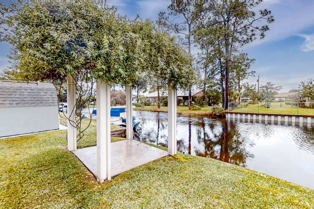 Dog-friendly canal-front home near Lake Jackson with water views, grill, firepit