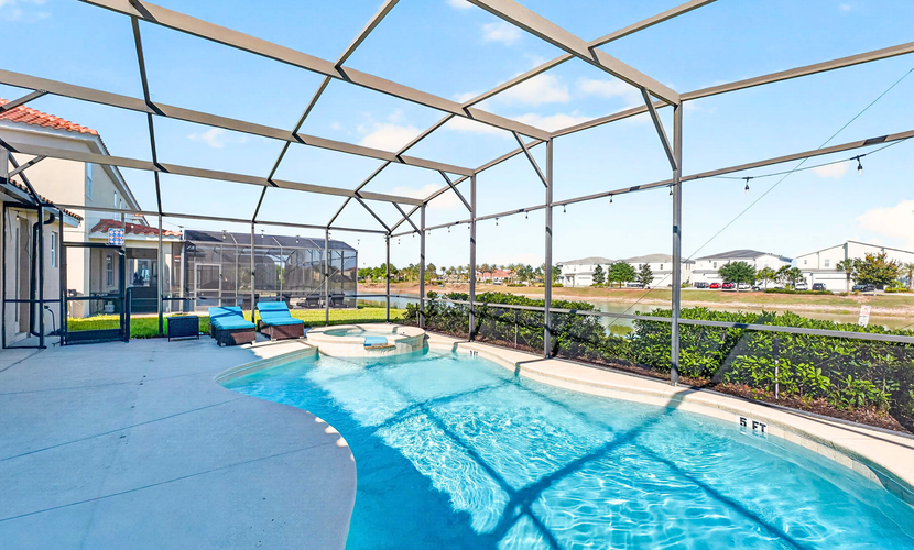 Spacious, lakefront home with a lanai, private pool, spa, & washer/dryer