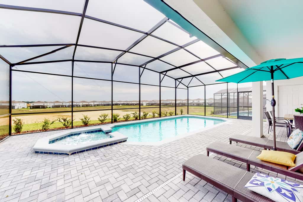 Exquisite home with pool, lanai, game room, central AC, & washer/dryer
