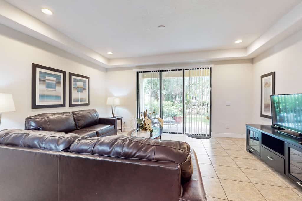 Charming dog-friendly home with pool, hot tub, fitness center, patio, & kitchen