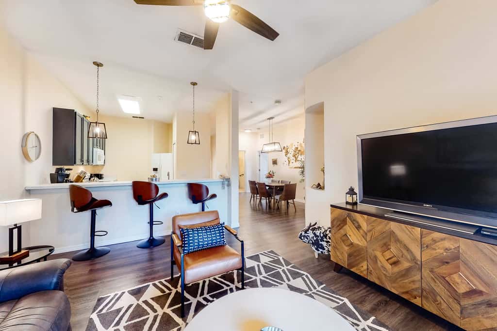 First floor lake view condo w/ pool & hot tub access, private W/D, & central AC