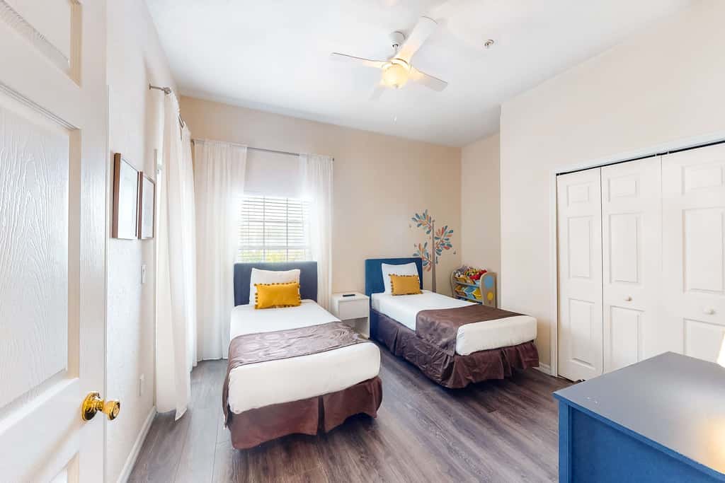 First floor lake view condo w/ pool & hot tub access, private W/D, & central AC