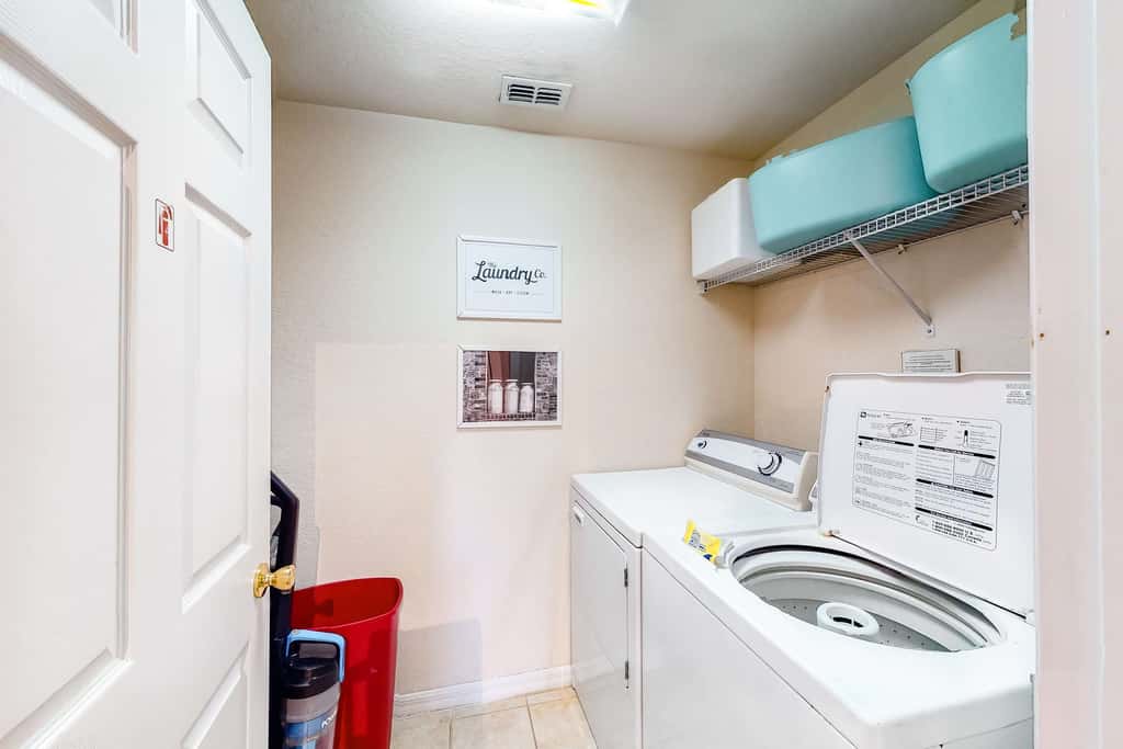 First floor lake view condo w/ pool & hot tub access, private W/D, & central AC