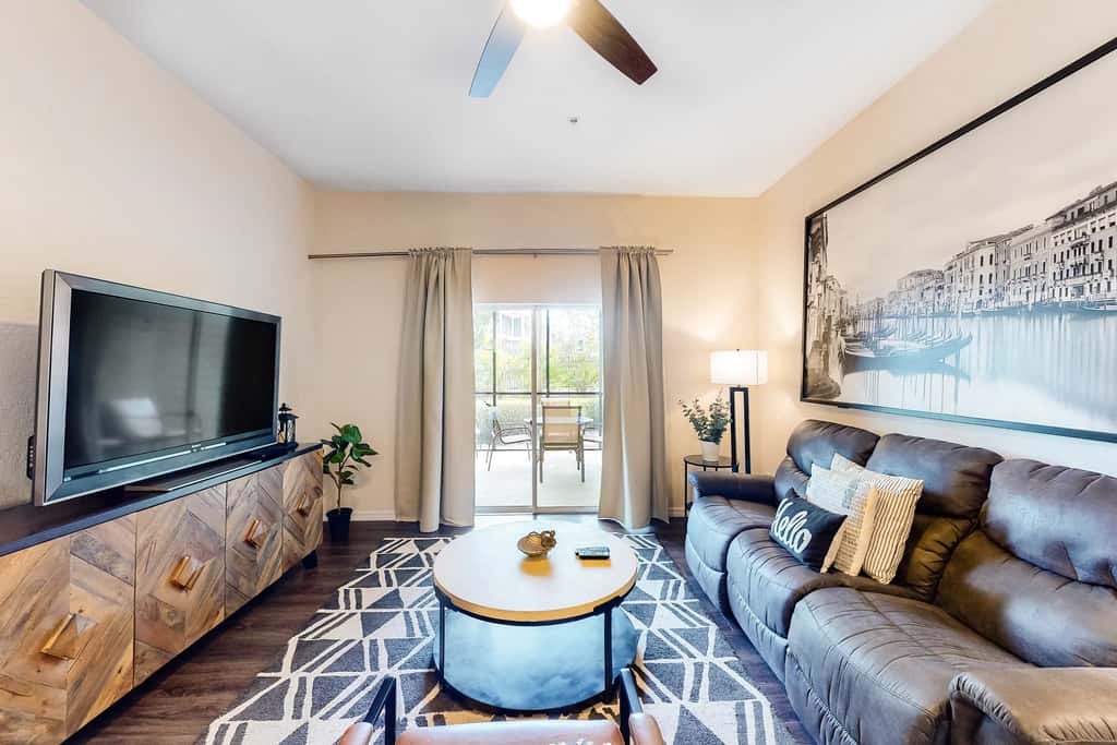 First floor lake view condo w/ pool & hot tub access, private W/D, & central AC