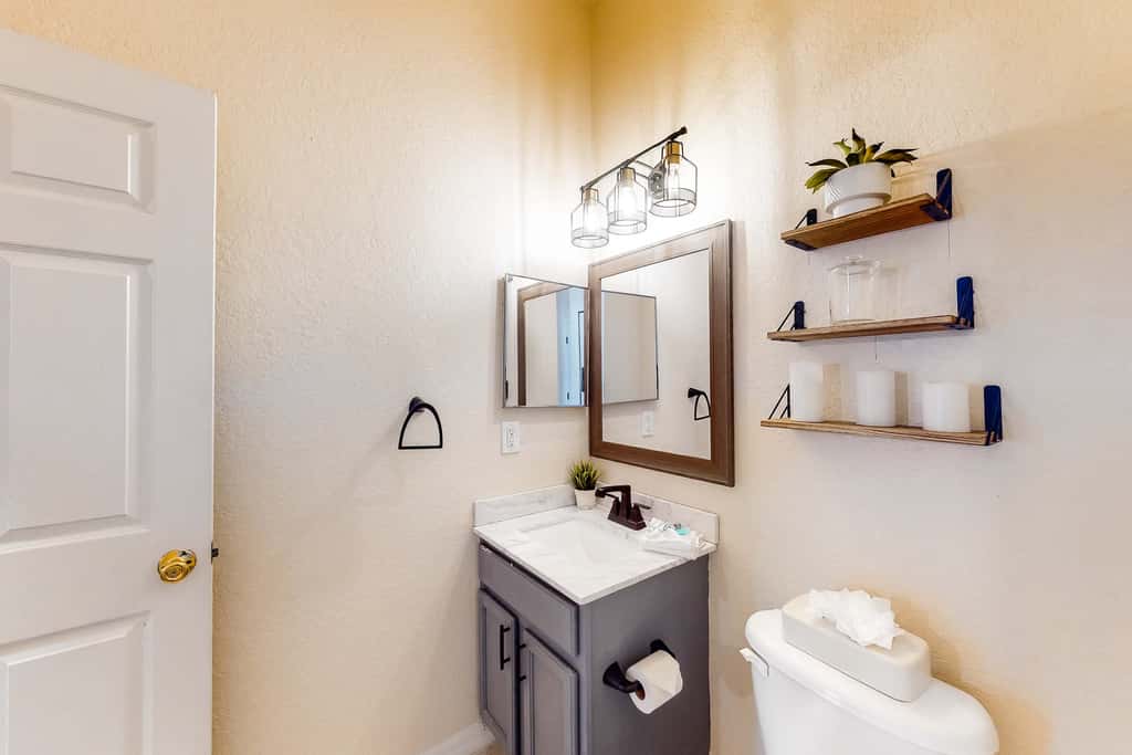 First floor lake view condo w/ pool & hot tub access, private W/D, & central AC
