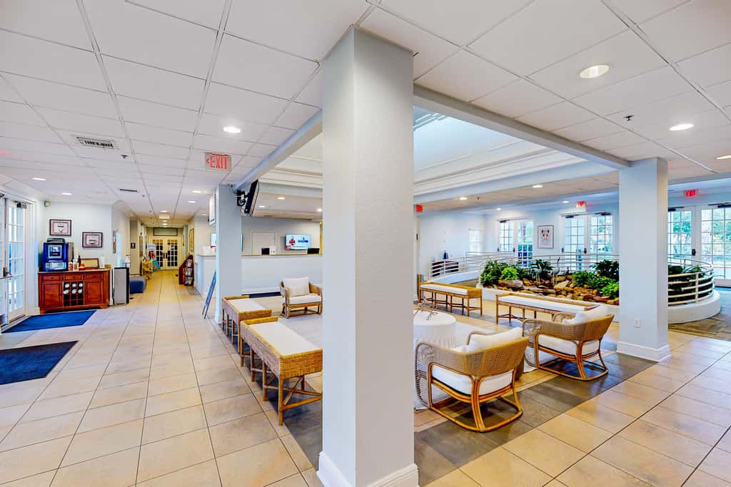 First floor lake view condo w/ pool & hot tub access, private W/D, & central AC