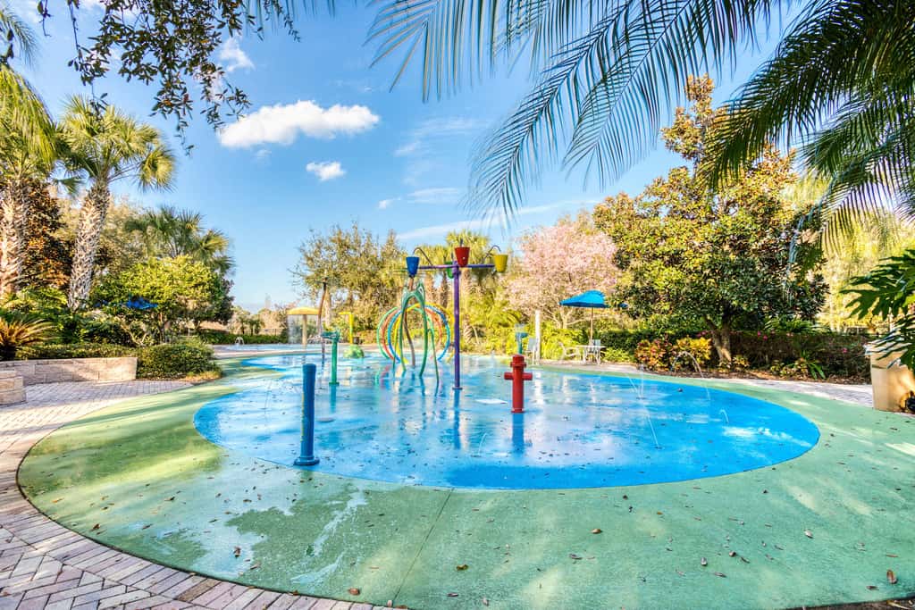 First floor lake view condo w/ pool & hot tub access, private W/D, & central AC