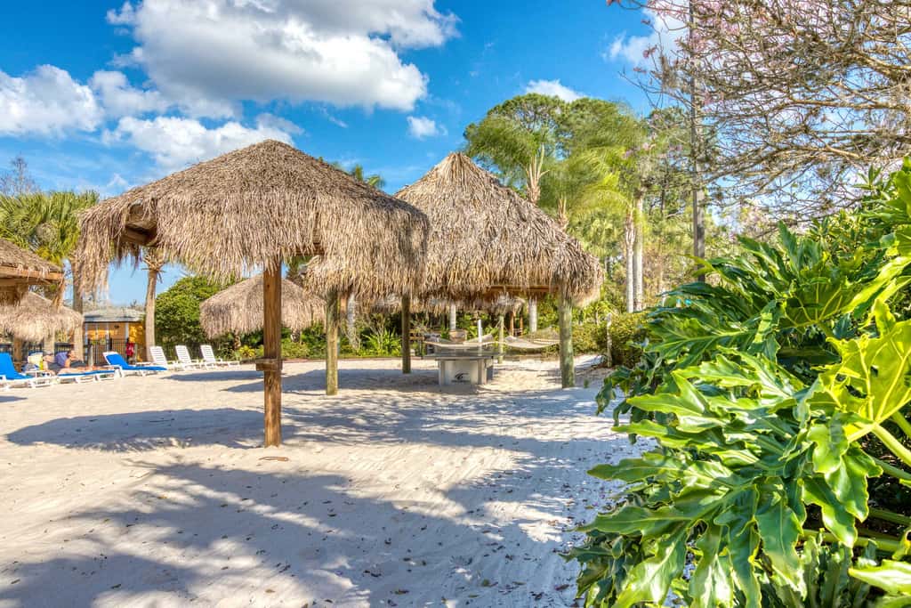 First floor lake view condo w/ pool & hot tub access, private W/D, & central AC