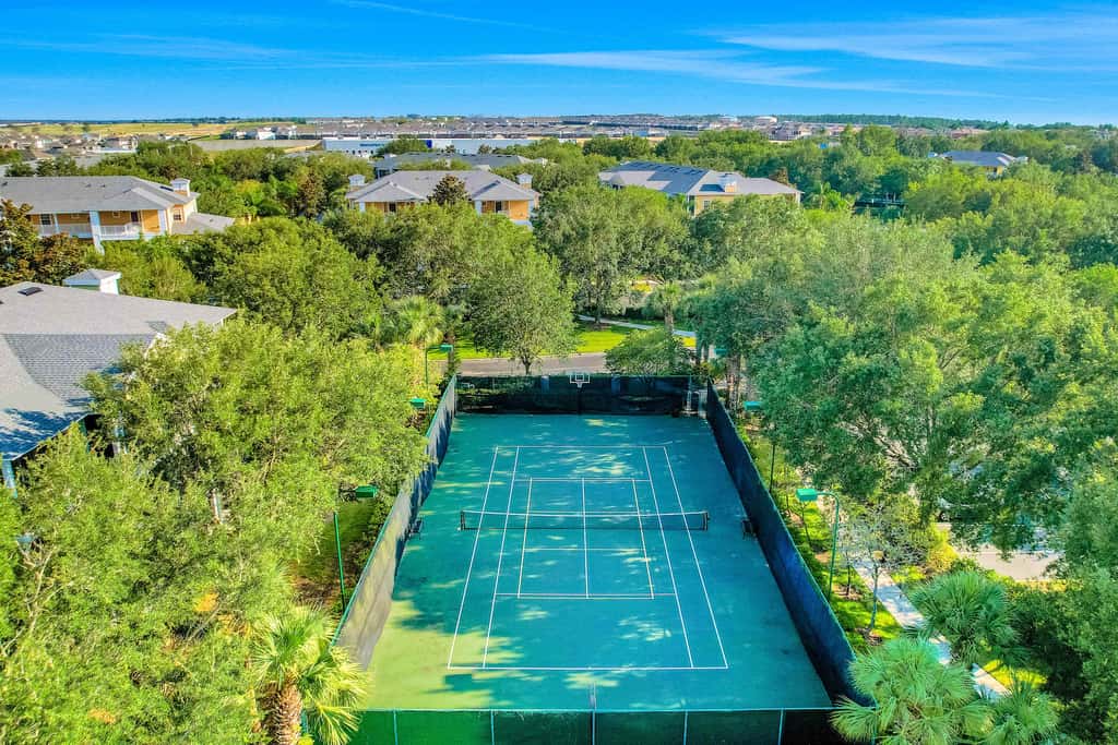 First floor lake view condo w/ pool & hot tub access, private W/D, & central AC