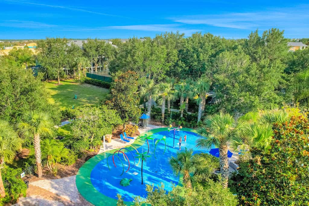First floor lake view condo w/ pool & hot tub access, private W/D, & central AC