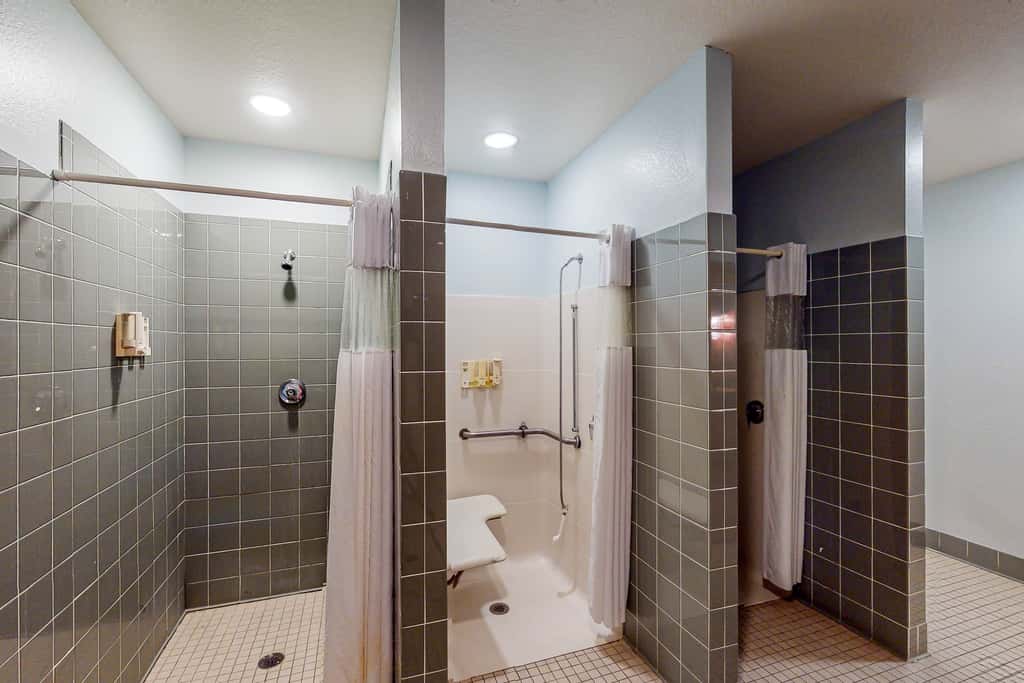 First floor lake view condo w/ pool & hot tub access, private W/D, & central AC