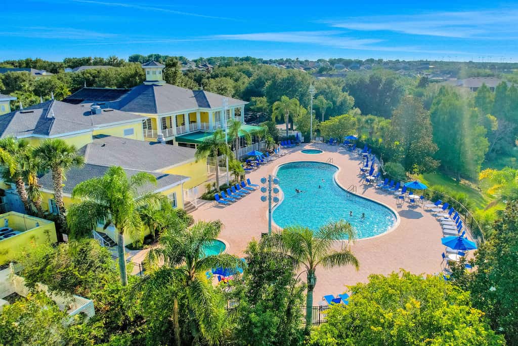 First floor lake view condo w/ pool & hot tub access, private W/D, & central AC