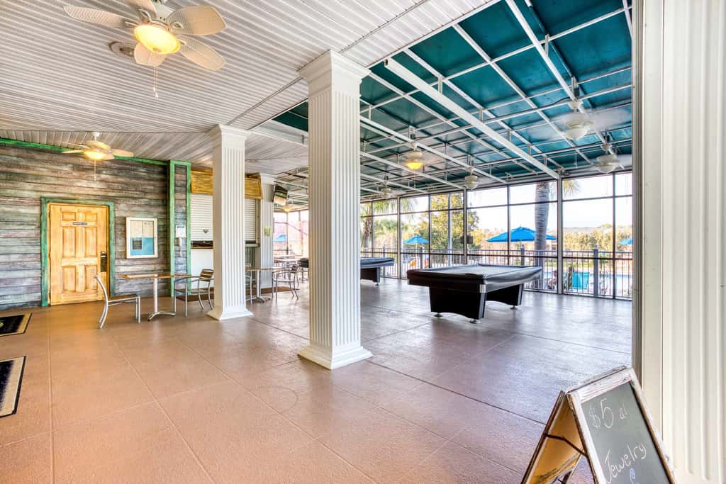 First floor lake view condo w/ pool & hot tub access, private W/D, & central AC