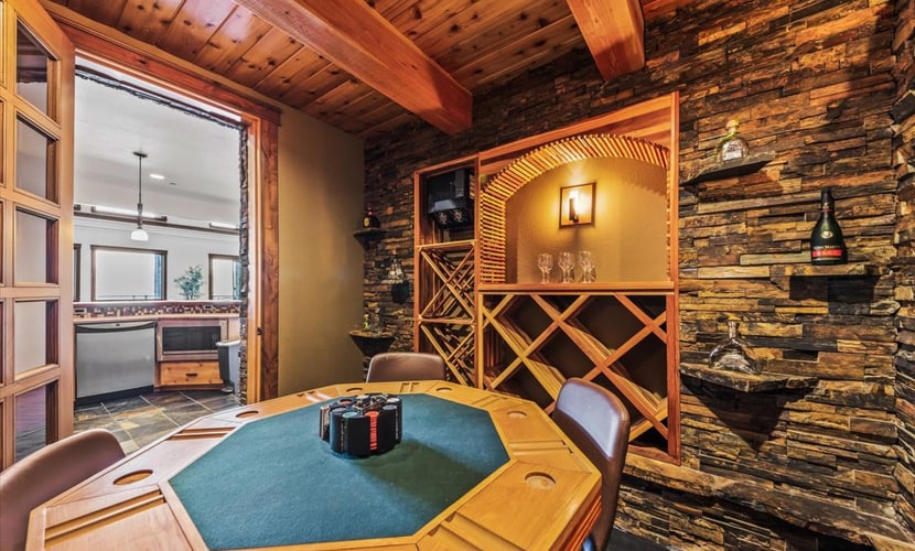 Lake mornings, mountain sunsets, and your private slice of Hayden Lake—bring the whole crew. Welcome to a 4-bedroom, 4-bath home designed for groups and families who want everyone fed, entertained, and happy under one roof. Sleeps 10 across four generously sized bedrooms, each with its own full bathroom. Hot tub with views of the water. Covered dock with 75 feet of deep waterfront access. Game room, movie theater room, sauna, and gym. Kayaks included—launch straight from your private dock. This is the home you book when the whole extended family is coming.