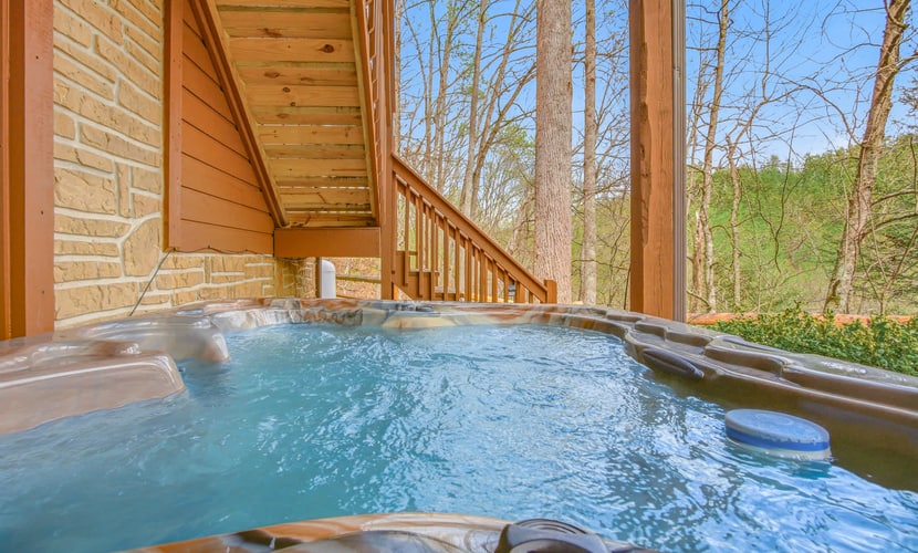 Escape to Cozy Vibes, a peaceful 2-bedroom cabin in Wears Valley near Sevierville. Enjoy wooded mountain surroundings, a private hot tub, pool table, fire pit, and spacious gathering areas. Guests also have access to a seasonal community pool and fishing pond at Honeysuckle Meadows. Pigeon Forge, Gatlinburg, and Great Smoky Mountains National Park are all within easy driving distance.