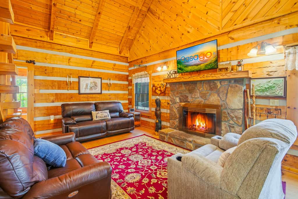 🐻 Welcome to Bear Paw Cove – A True Smoky Mountain Log Cabin Retreat

Experience the best of mountain living at Bear Paw Cove, a charming true log cabin nestled in the heart of Wears Valley 🌄. Perfectly positioned for convenience and adventure, you’ll enjoy easy access to Pigeon Forge, Gatlinburg, and the breathtaking beauty of Great Smoky Mountains National Park 🌲.

From the moment you arrive, you’ll feel the warmth and rustic charm that make this cabin a true Smoky Mountain escape.

🛏️ Comfortable & Spacious Sleeping

The thoughtfully designed floor plan offers space for everyone to relax:

• Two main-level bedrooms, including a spacious primary suite with a King bed 👑
• Spa-style primary bathroom featuring a walk-in shower, rain head 🚿, and soothing body jets
• An open loft with additional sleeping space and a private full bath — perfect for guests who appreciate a little extra privacy

🛋️ Cozy Mountain Living

The main living area welcomes you with warm wood interiors, vaulted ceilings, and a stunning stone fireplace 🔥ideal for cozy evenings after a day of adventure.

The fully equipped kitchen 🍳 flows seamlessly into the dining area, making mealtime easy and enjoyable. An oversized laundry room with a folding station 🧺 adds everyday convenience, especially for extended stays.

Start your mornings in the bright sunroom ☀️ with a peaceful cup of coffee, or head to the game room 🎱 for indoor fun the whole family will love.

🌲 Outdoor Relaxation

Step outside to your private deck and soak in the hot tub ♨️ while enjoying the fresh mountain air. The fenced backyard offers added privacy, and the fire pit 🔥 is perfect for gathering under the stars and sharing stories after sunset ✨.

Whether you’re planning a family getaway, couples retreat, or Smoky Mountain adventure, Bear Paw Cove offers the perfect blend of rustic charm, modern comfort, and unbeatable location. 🏔️