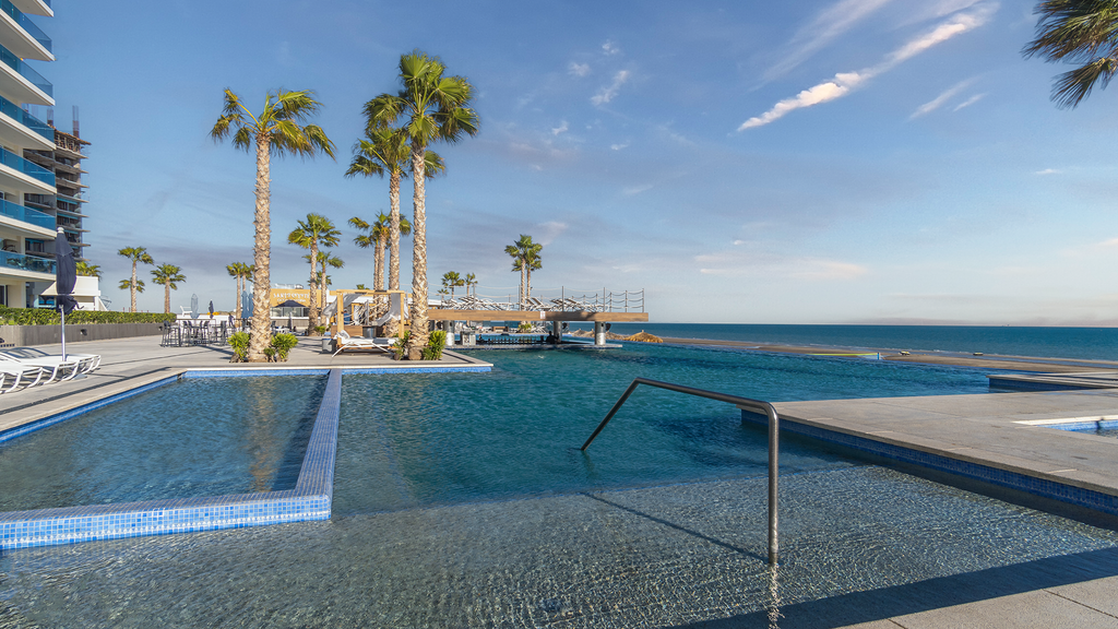 New and Amazing 3 bedroom Ground Floor Corner Beach Front Encantame C-101