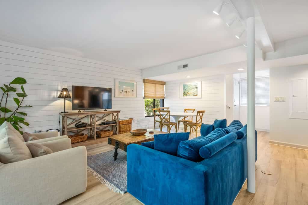 A quiet 2-bedroom villa tucked under tall trees in South Forest Beach. Walk to the beach in under 10 minutes or bike there in 5 minutes along a shaded trail to Alder Lane. Three pools and tennis courts are steps from your door. Sleeps 5 with a king bed, queen bed, and sleeper sofa. Coligny Plaza, with 60-plus shops and restaurants, is a short bike ride away.