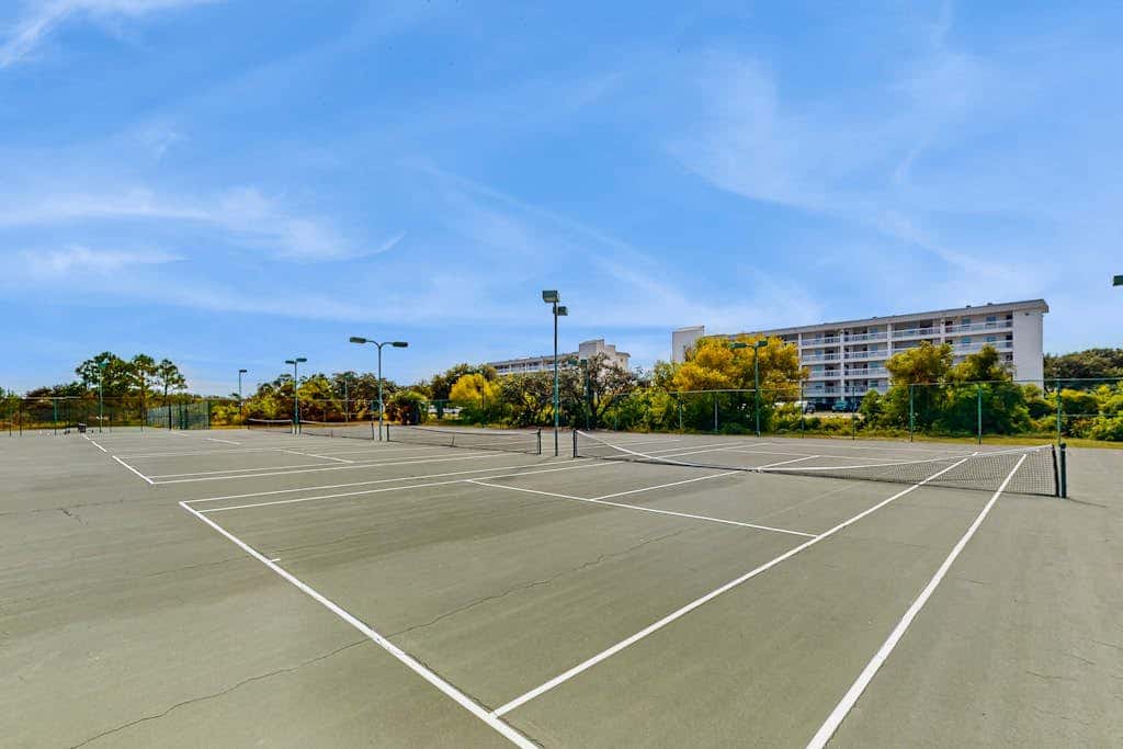 Waterfront getaway with beach view, shared pools & sports courts