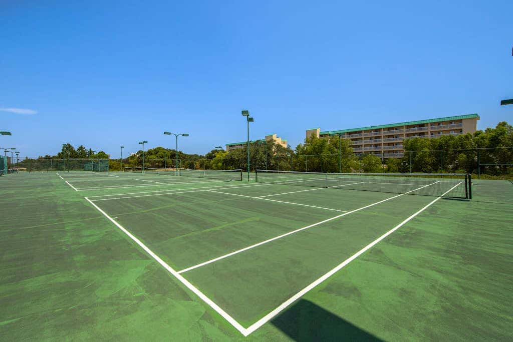 Waterfront getaway with beach view, shared pools & sports courts