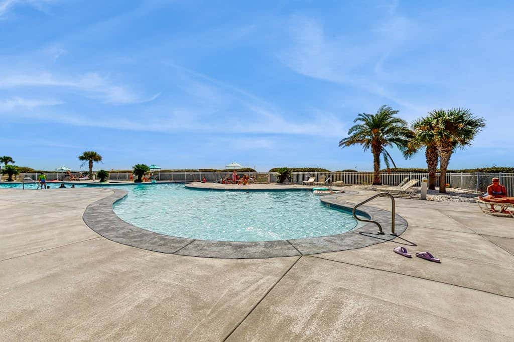 Waterfront getaway with beach view, shared pools & sports courts