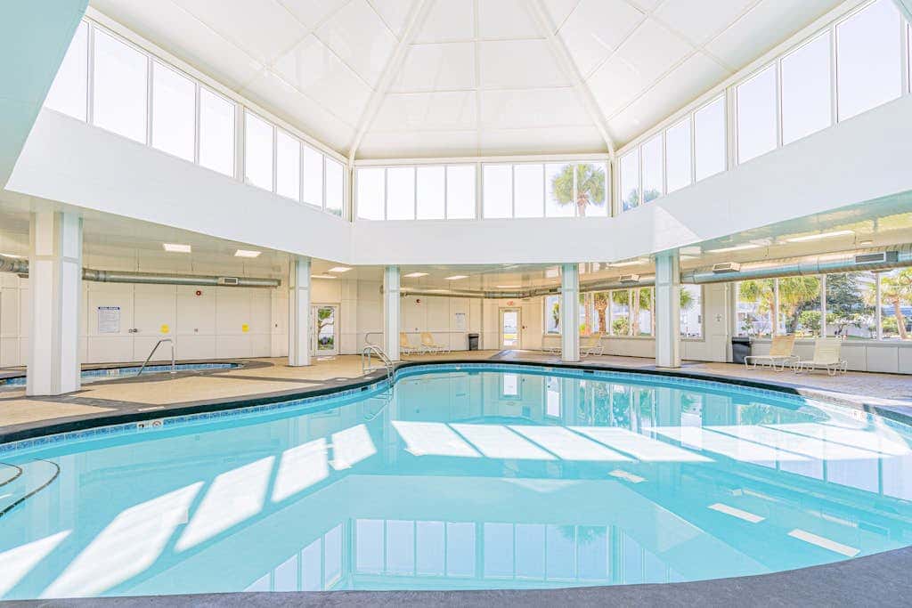 Waterfront getaway with beach view, shared pools & sports courts