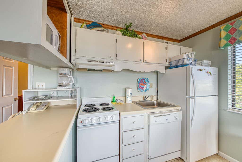 Waterfront getaway with beach view, shared pools & sports courts