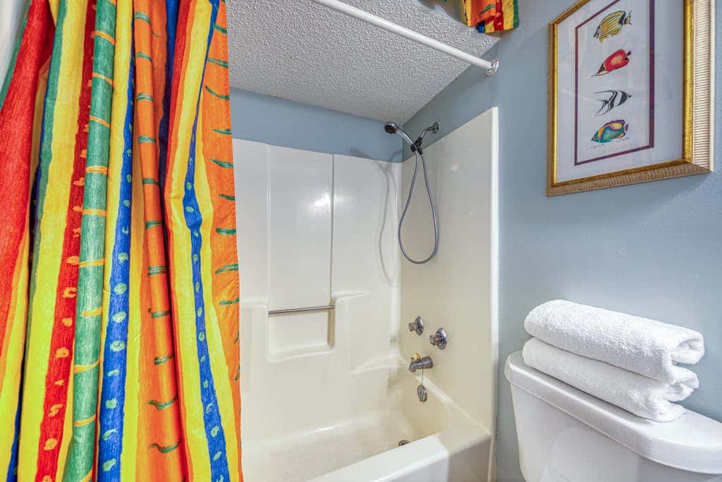 Waterfront getaway with beach view, shared pools & sports courts
