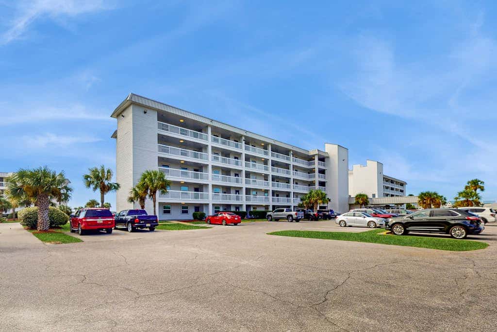 Waterfront getaway with beach view, shared pools & sports courts