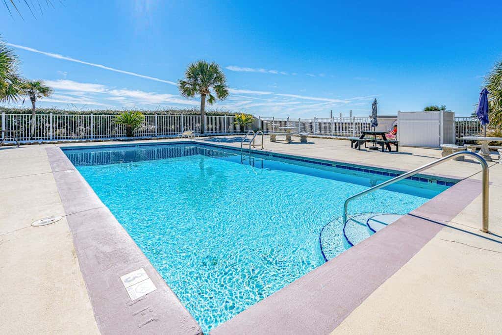 Waterfront getaway with beach view, shared pools & sports courts