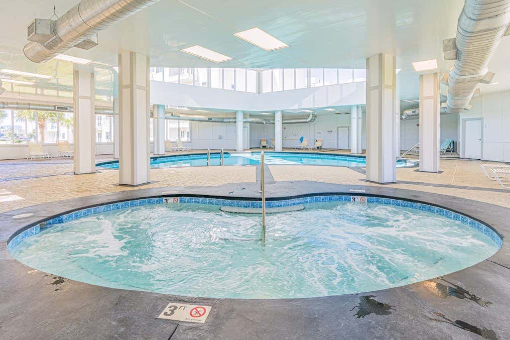 Waterfront getaway with beach view, shared pools & sports courts