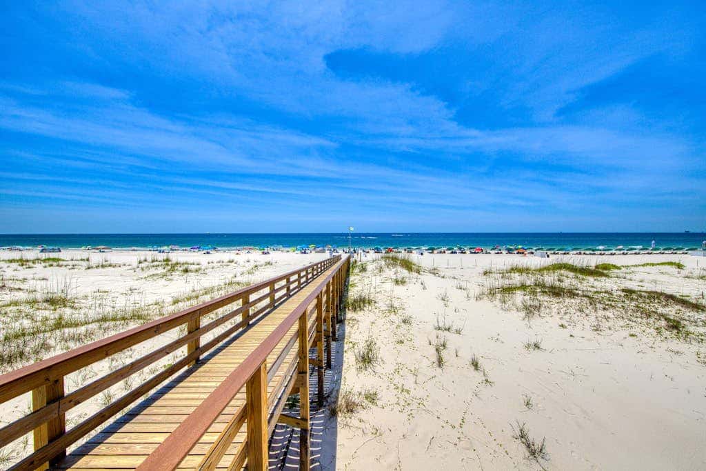 Waterfront getaway with beach view, shared pools & sports courts