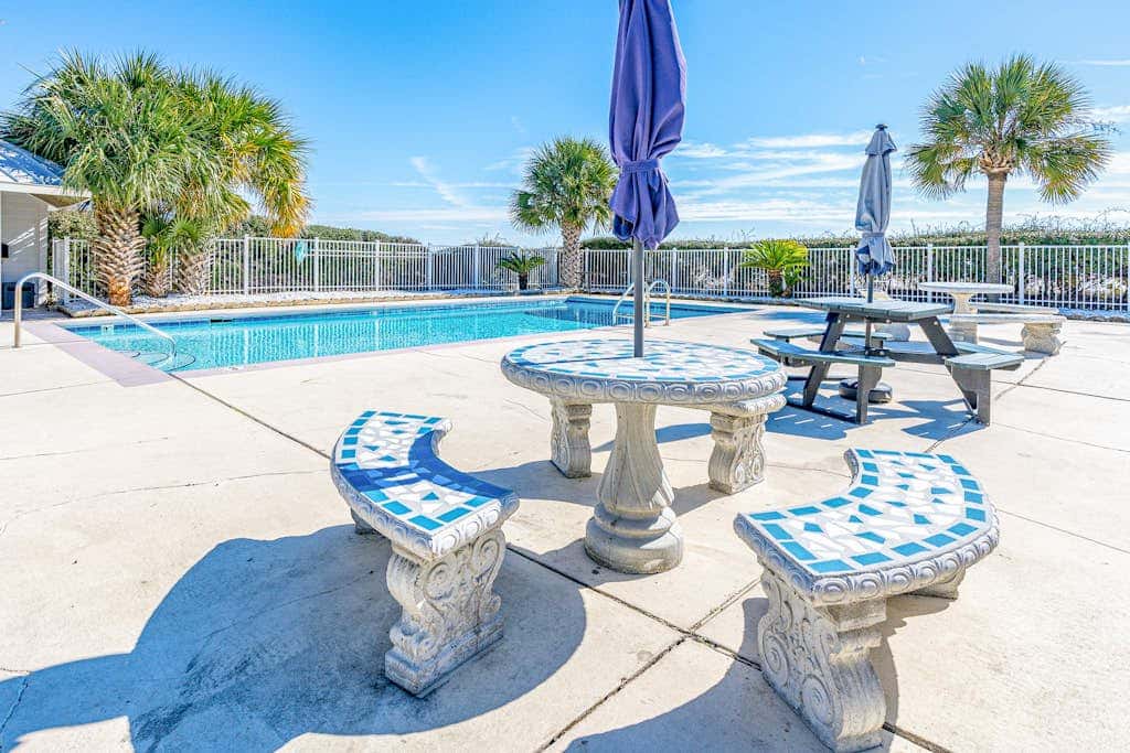 Waterfront getaway with beach view, shared pools & sports courts