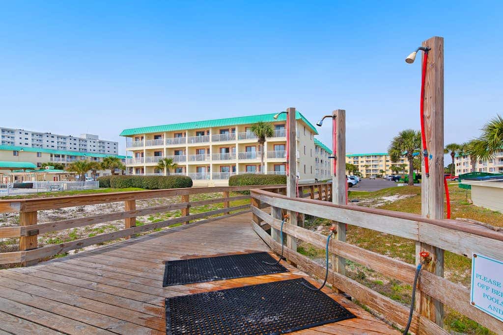 Waterfront getaway with beach view, shared pools & sports courts