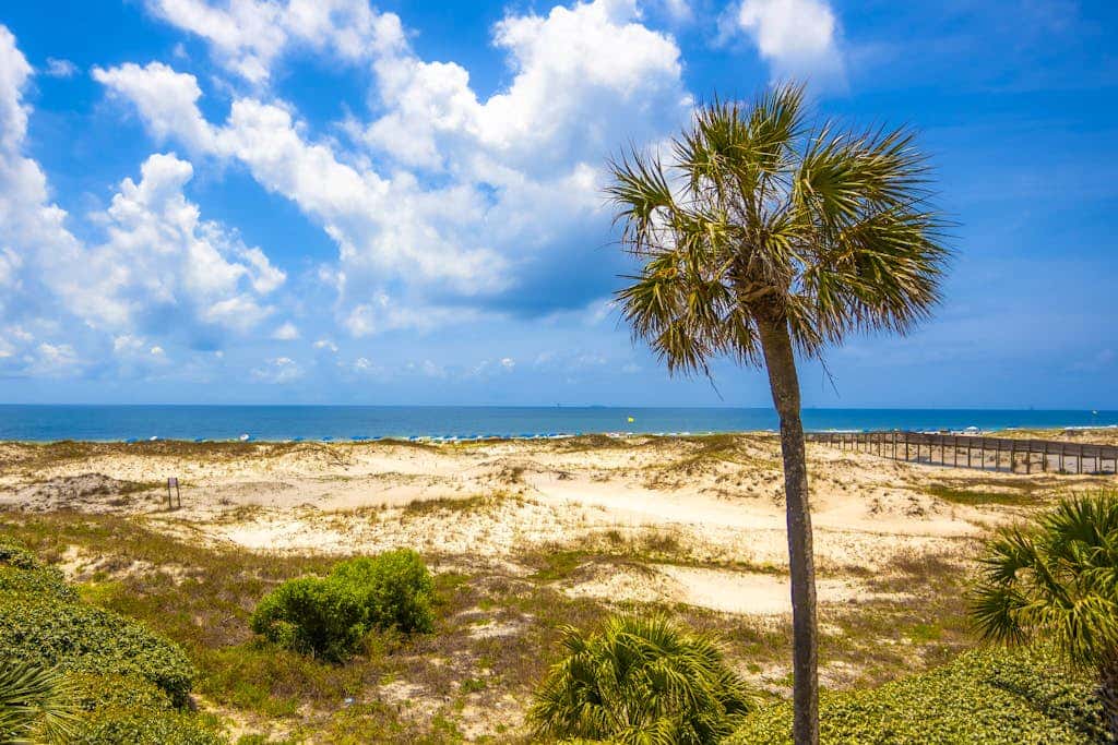 Waterfront getaway with beach view, shared pools & sports courts