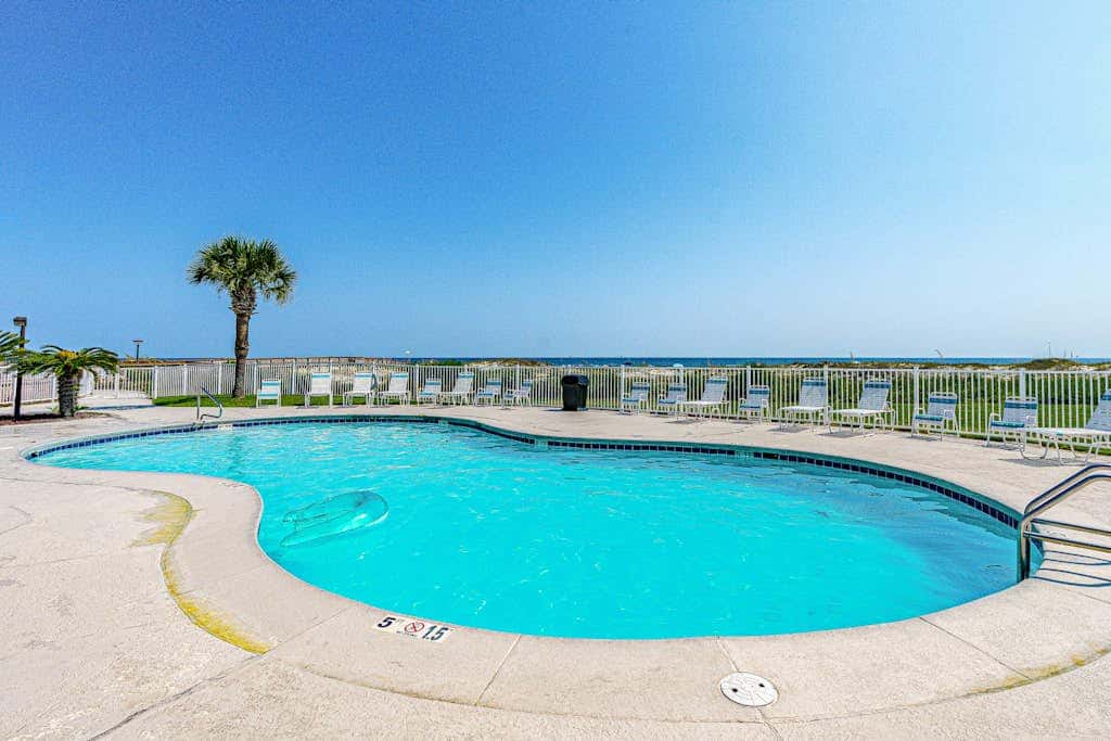 Waterfront condo with shared pool & hot tub - near dining & the beach