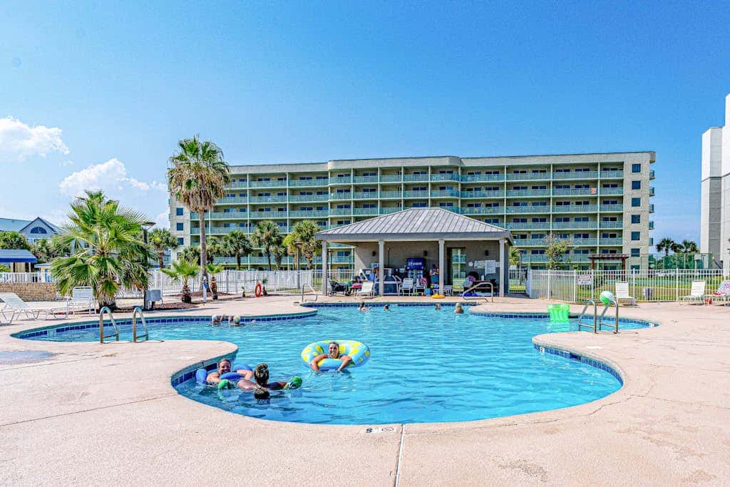 Waterfront condo with shared pool & hot tub - near dining & the beach