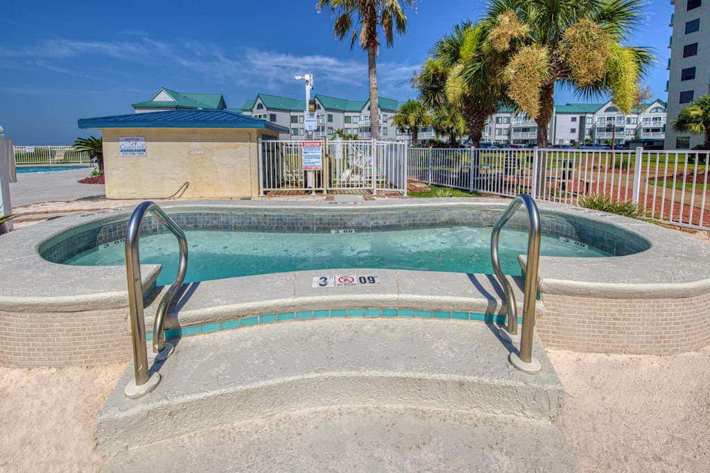 Beachfront condo with balcony, Gulf views, pools, gym, & game room at Plantation Palms