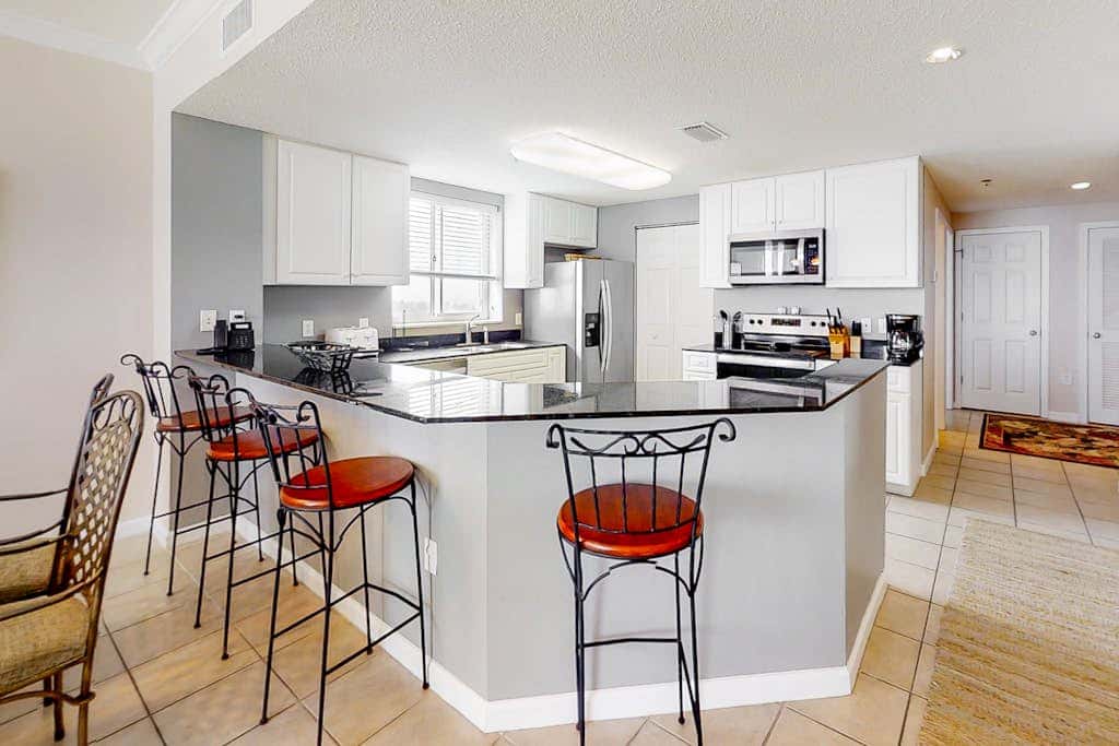 Beach front condo with amazing views, pool, & hot tub