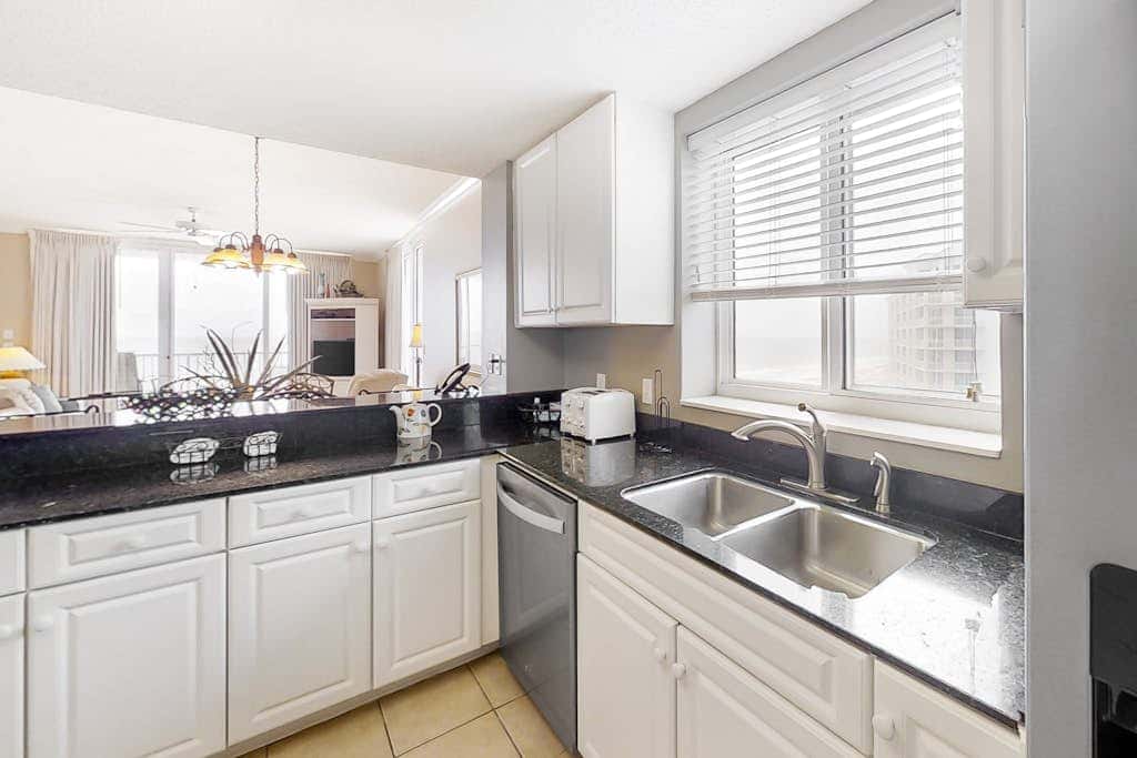 Beach front condo with amazing views, pool, & hot tub