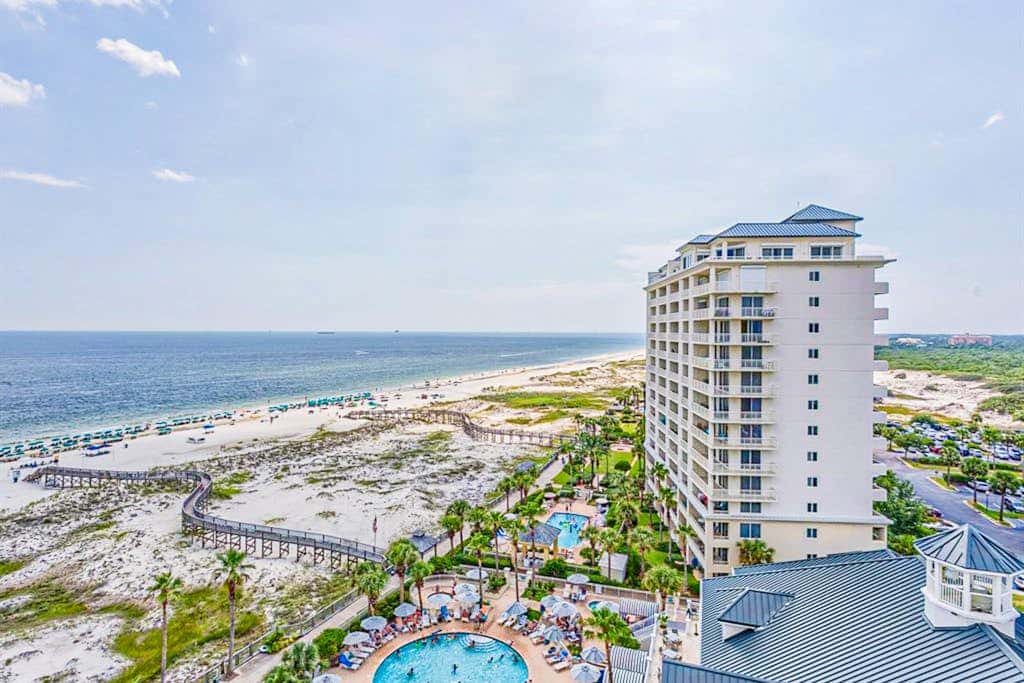 Beach front condo with amazing views, pool, & hot tub