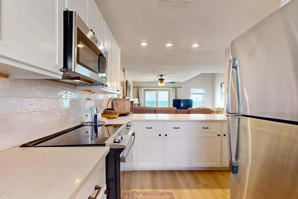 Multi-Level, Beachfront Condo w/ Gulf Views, Deck, WiFi, AC & Shared Pool