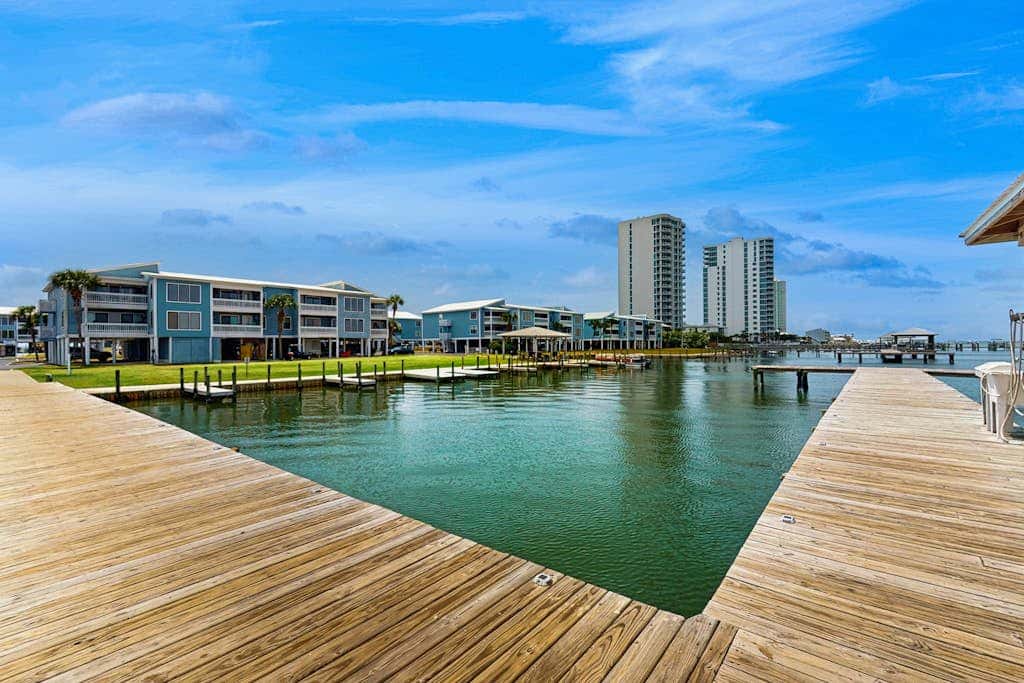 Lagoon-front Condo with Shared Pool, Pier, and Beach Access
