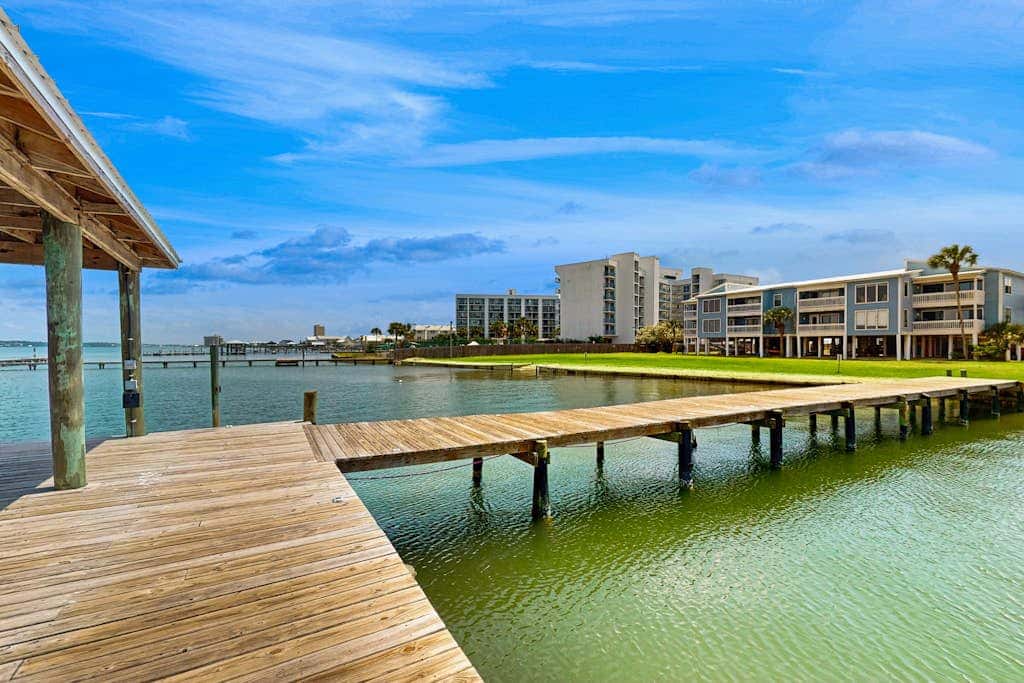 Lagoon-front Condo with Shared Pool, Pier, and Beach Access