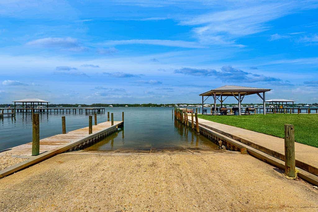 Lagoon-front Condo with Shared Pool, Pier, and Beach Access