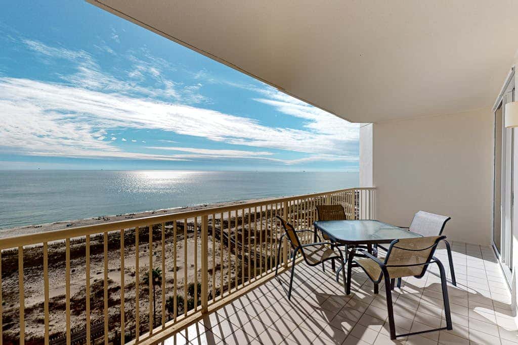 Gulf-front 10th-floor condo with beach views, sauna, gym, volleyball, pools, AC