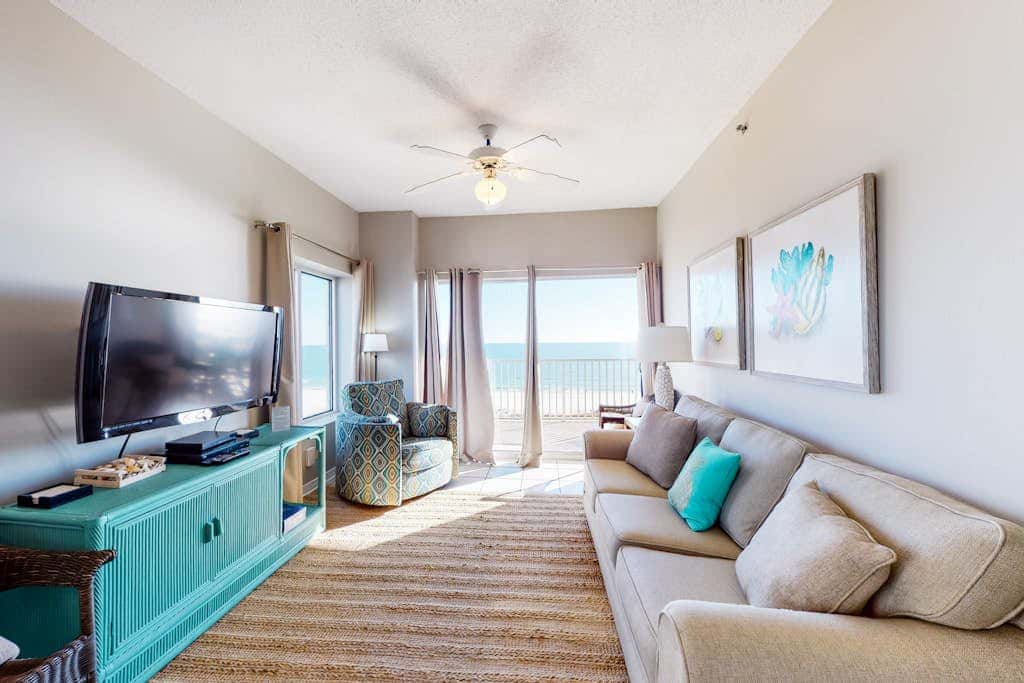 Beachfront vacation home with spacious balconies, beach access, pools & hot tub