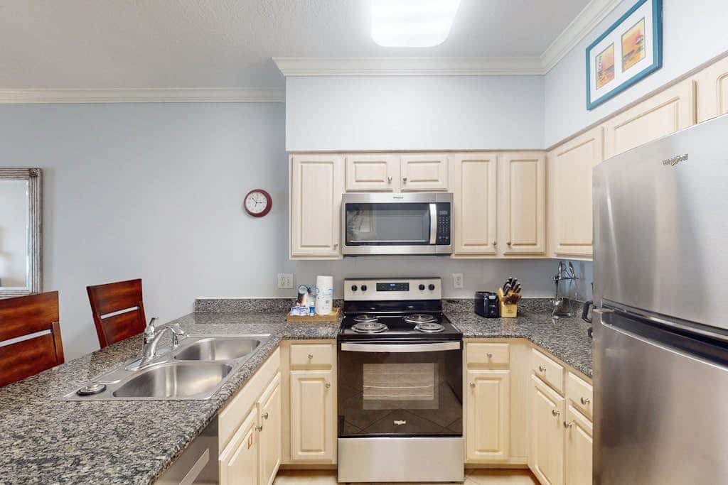 Beach-front condo with pool, hot tub, sauna, washer,dryer & grill