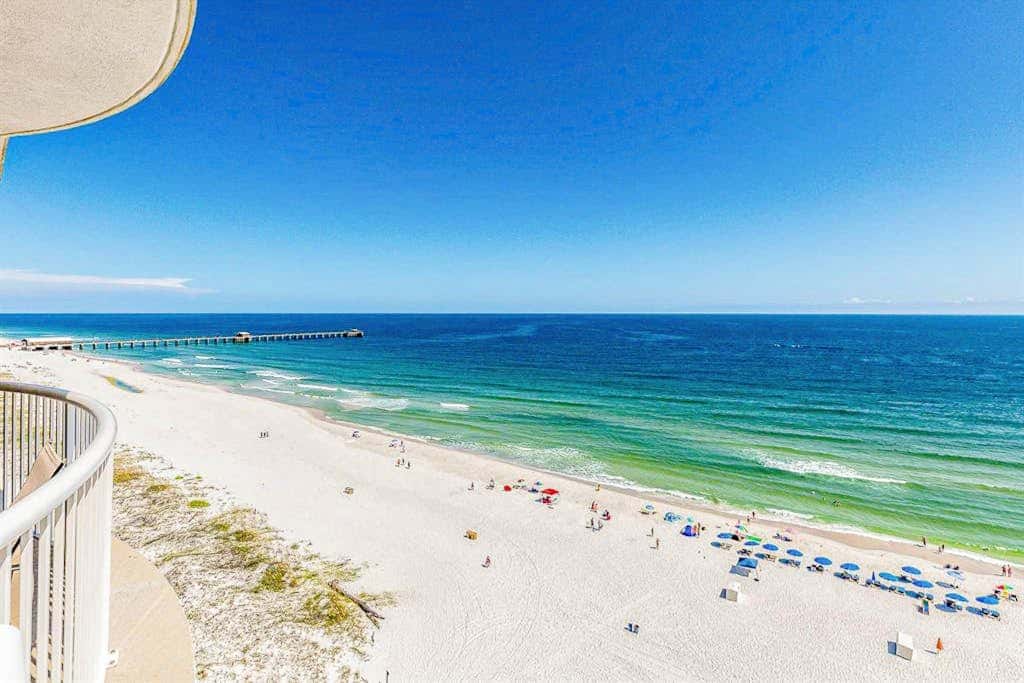 Beach-front condo with pool, hot tub, sauna, washer,dryer & grill
