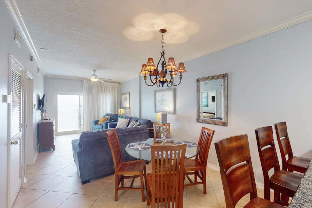 Beach-front condo with pool, hot tub, sauna, washer,dryer & grill